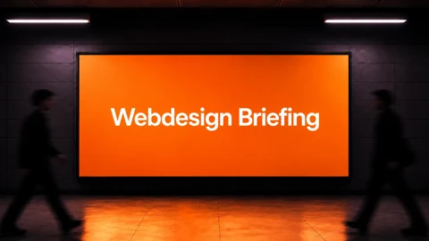 Orange leuchtende Tafel mit dem Text Webdesign Briefing